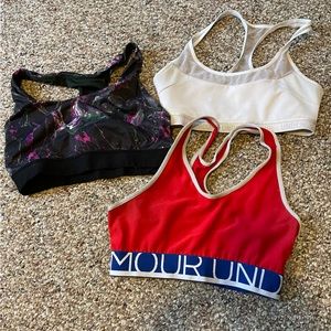 3 small sports bras. 2 under armour and one target brand.